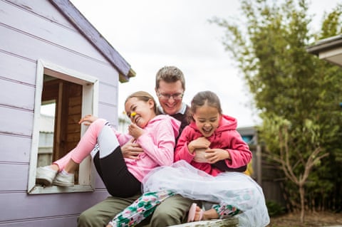 Mike Dwyer and his daughters Penelope and Piper in the backyard of their Mernda home in Melbourne’s outer north
