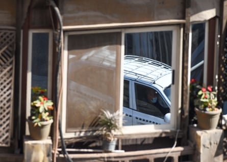 A taxi seen through an apartment window in Zamalek, Cairo, in 2021.