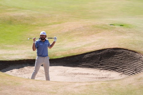 Cameron Young reacts after missing par from a bunker on the 18th.