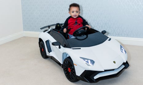 One-year-old Thiago Greer in his toy Lamborghini