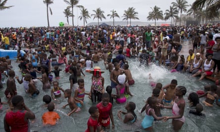New Year’s Day in Durban … the beach is crowded with people who a generation ago were not allowed on the sand