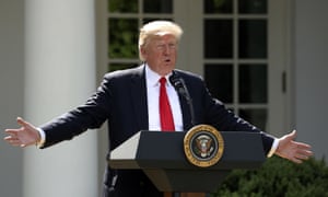 President Donald Trump speaks about the U.S. role in the Paris climate change accord in the Rose Garden of the White House in Washington.