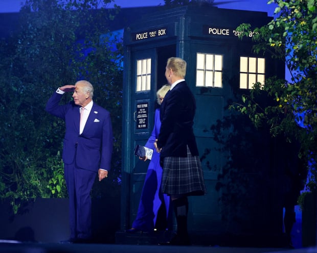 King Charles and Queen Camilla step out of the Tardis
