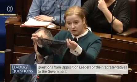 Ruth Coppinger holds up a thong in the Irish parliament.