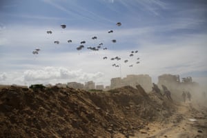 The US air force drops humanitarian aid by parachute to Palestinians in Gaza City