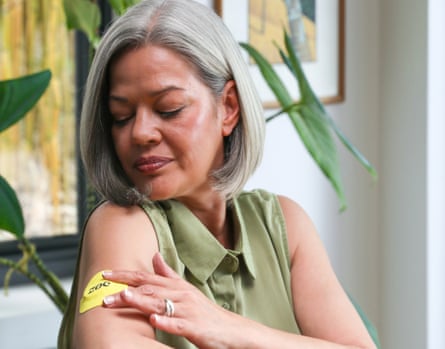 A woman wearing one of Zoe’s continuous glucose monitors.