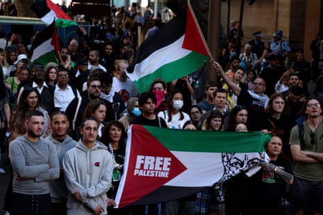 Demonstrators chant slogans as they march in a protest rally in Sydney against Israeli military action in Gaza