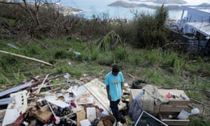 Tristan Joseph stands among his family’s ruined possessions one week after Hurricane Irma destroyed his home in Charlotte Amalie, St Thomas, US Virgin Islands.