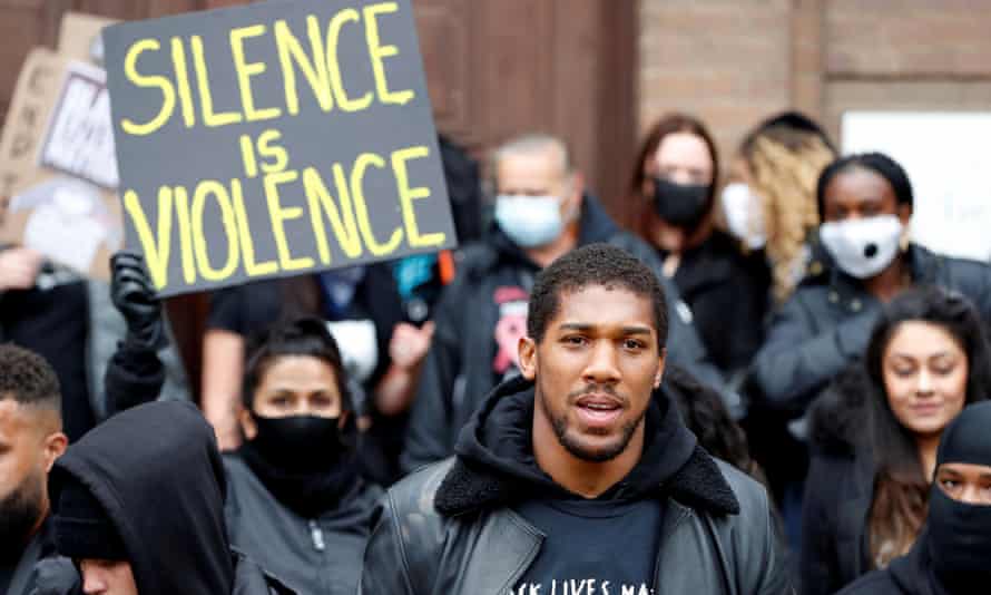 Boxer Anthony Joshua is seen with protesters during a Black Lives Matter protest in Watford.