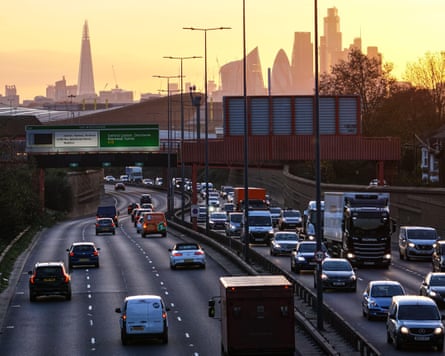 Traffic on A12 road with City of London skyscrapers in the background