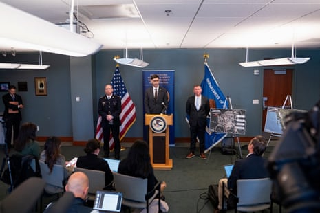 Officials announce an arrest at a US Attorney's Office press conference in Seattle