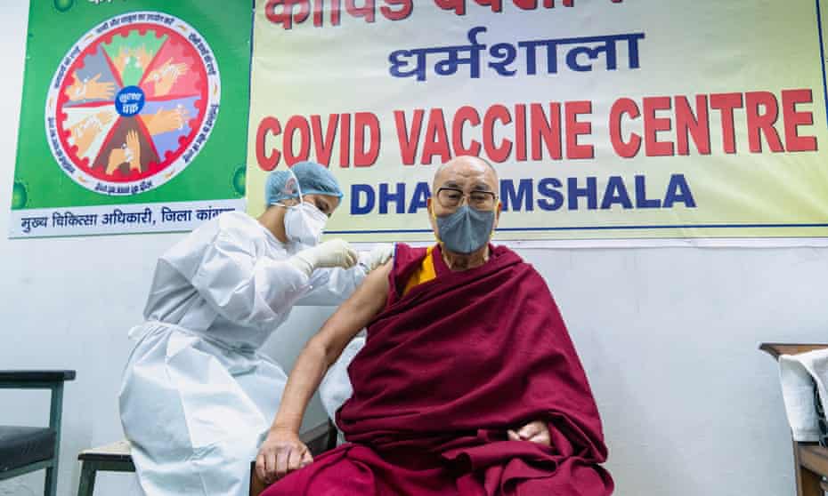 The Dalai Lama receiving the vaccine at Zonal hospital.