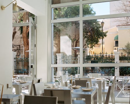 Linou Soumpasis and Sia restaurant, Athens. Daytime, Chairs , tables, glasses.
