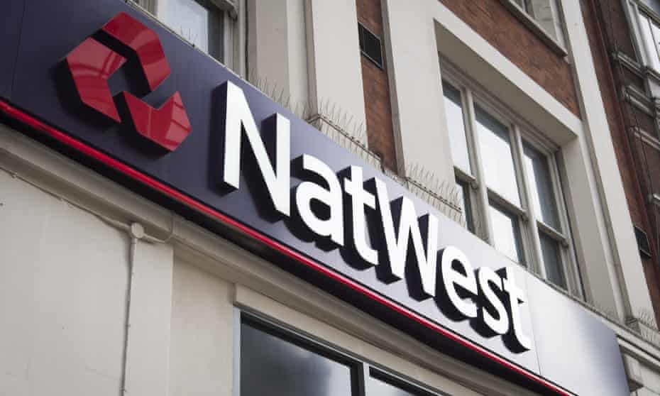 NatWest sign and logo outside bank branch.
