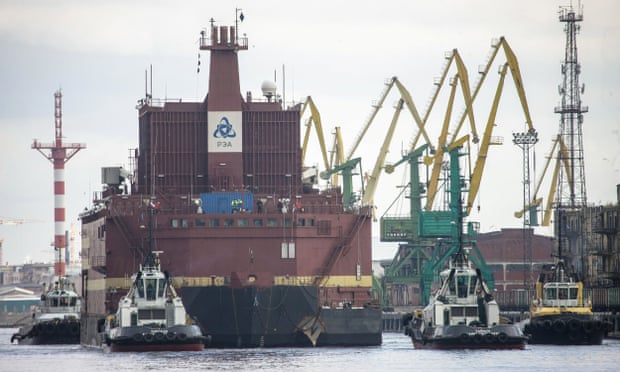 The Akademik Lomonosov is towed out of St Petersburg, Russia
