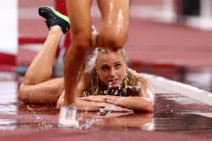 Genevieve Gregson of Australia reacts after falling down in the women’s 3000m steeplechase final during the Tokyo 2020 Olympics