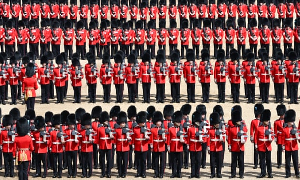 Members of the Household Division take part in trooping the colour