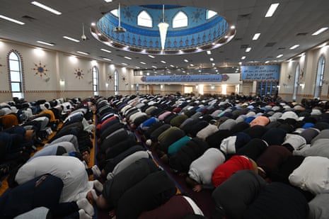 Worshippers participating in Eid al-Fitr prayers signifying the end of Ramadan at the Lakemba mosque in Sydney