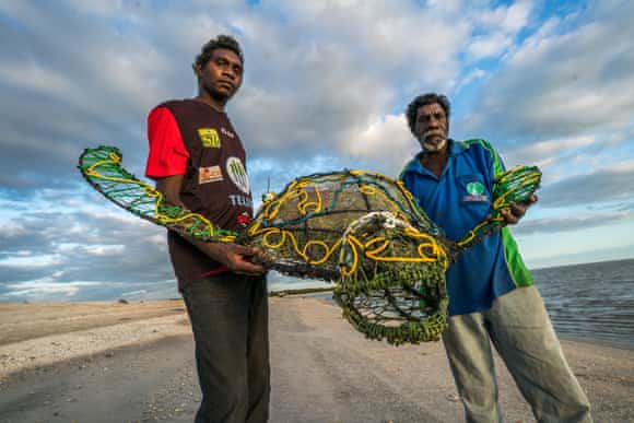 Michael Norman (right) and his grandson Shannon, artists at Pormpuraaw.