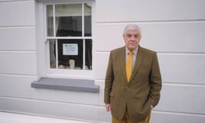 Andrew Eastman outside his cottage in Appledore.