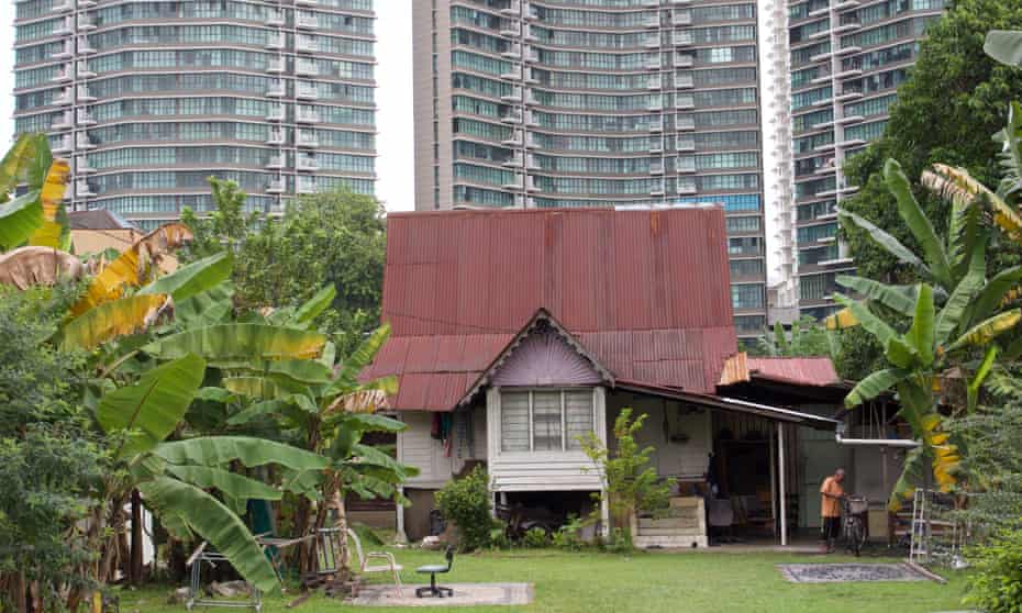 A Village Amid Skyscrapers How Long Can Kuala Lumpur S Enclave Hold Out Cities The Guardian
