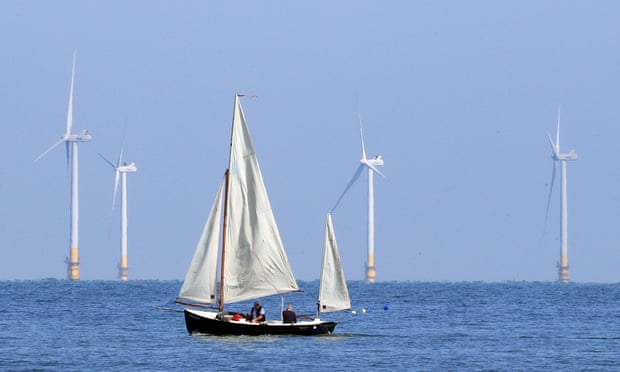 A sailing boat passes the Kentish Flats offshore windfarm. 