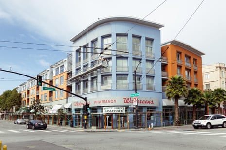 Image of Walgreens storefront and other buildings seen from the street