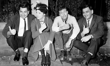 Richard, left, and Robert Sherman, right, on the set of Mary Poppins, with Julie Andrews and Dick Van Dyke.