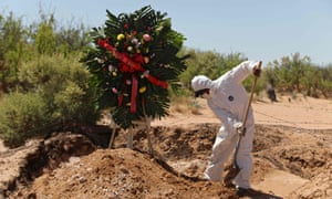 Coronavirus live news: record daily cases in South Africa as India extends lockdown 5 A cemetery worker covers the grave of a woman in an area of the San Rafael municipal pantheon designated for victims of the novel coronavirus, Covid-19, in Ciudad Juarez, Chihuahua State, Mexico, on 17 May 2020.