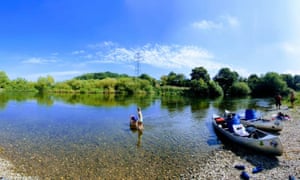 Canoes on a bend in river