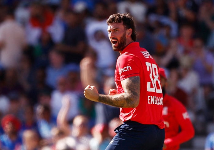 Reece Topley celebrates after taking the wicket of India’s Rohit Sharma.