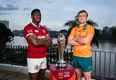 Maro Itoje of British & Irish Lions (left) and Harry Wilson of Australia pose with the trophy before the first Test.