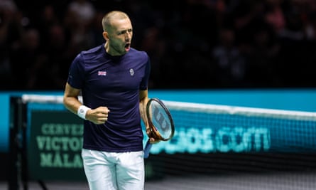 Dan Evans celebrates winning a point