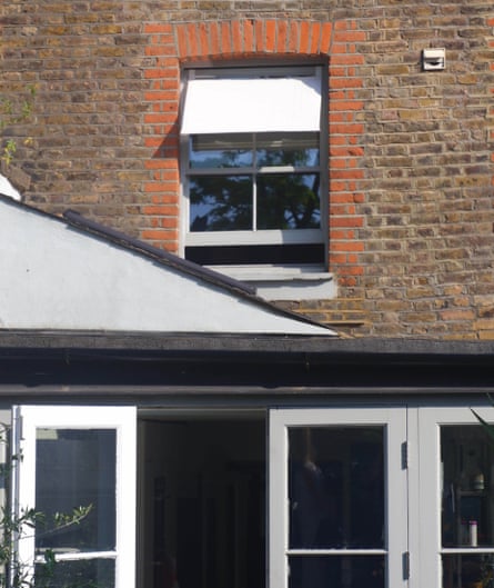 The Shaded Coconut Milk Exterior awning clipped on to a window