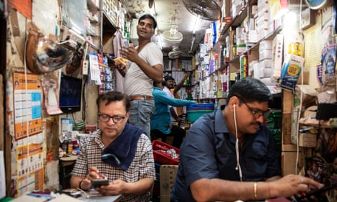 Workers at a pharmacy shop at Bhagirath Palace’s pharmaceuticals market in Old Delhi, India.