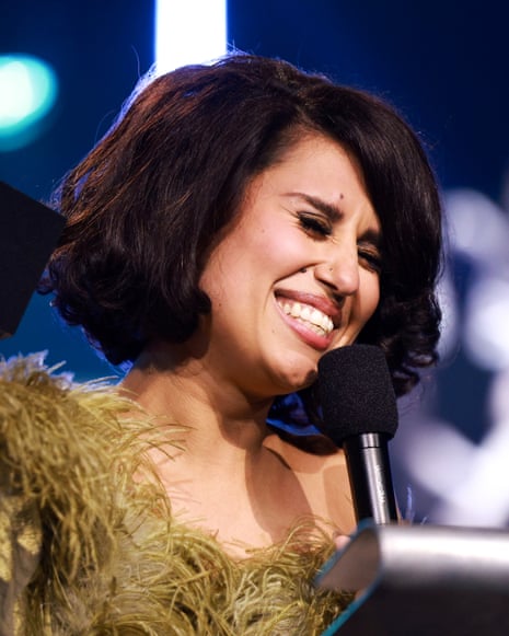 Raye accepts the 2026 Mercury prize.