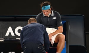 Raonic receiving treatment during his fourth round match Australian Open Tennis, Day Seven, Melbourne Park, Australia - 14 Feb 2021