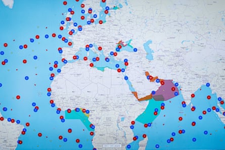 A digital map of the world covered in red and blue dots marking the positions of vessels