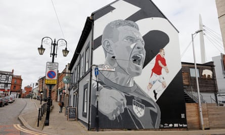 Mural of Mullin on the side of a building in Wrexham.