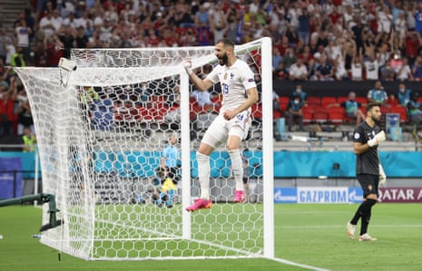 France’s Karim Benzema celebrates scoring their first goal.