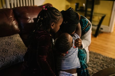Fatu Kante sits with her son, Aly, 2, and daughter Sera, 4, at their home in Philadelphia, PA. on Monday, February 25, 2020. Both Sera and Aly were found to have lead poisoning due to the old paint in their current home.