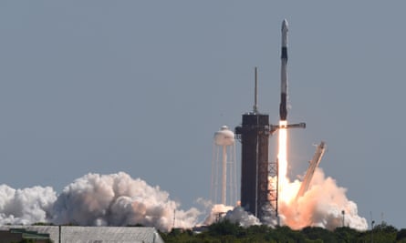 The SpaceX Falcon 9 rocket blasts off from Cape Canaveral, Florida, with the first all-commercial space team, bound for the International Space Station.