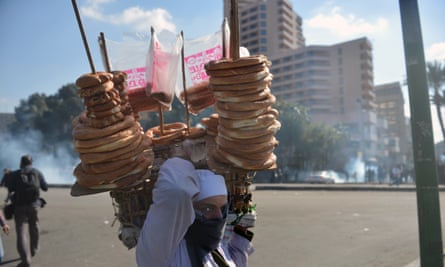 A street vendor near Tahrir Square, in 2013. In recent years, the Egyptian police have recruited some of them as informants.