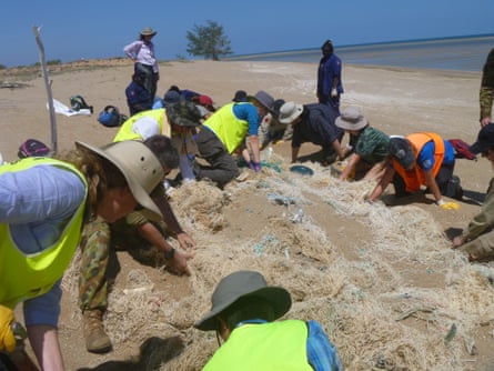 Tangaroa Blue volunteers retrieving ghost nets at a beach in Mapoon, Queensland