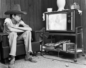Wendy Ewald, Johnny watching television, 1981Wendy Ewald is an American photographer and teacher. Ewald has collaborated on photography projects with children, families, women, workers and teachers. Her projects start as documentary investigations and move on to probe questions of identity and cultural differences. Her work is in the collections of Detroit Art Institute, Metropolitan Museum of Art, Duke University, Rhode Island School of Design and Whitney Museum of American Art, among others