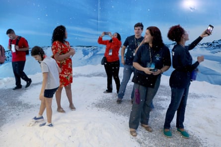 Delegates of the forum visit a space at the Citizen Village simulating life in the Brazilian base in Antarctica.