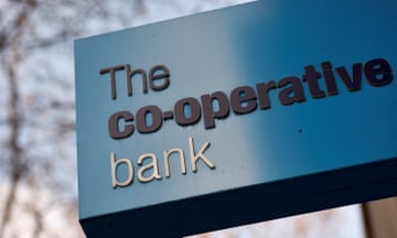 A Co-operative Bank sign hangs outside one of its branches