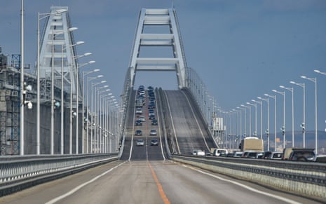 Cars drive across the Kerch bridge in annexed Crimea.