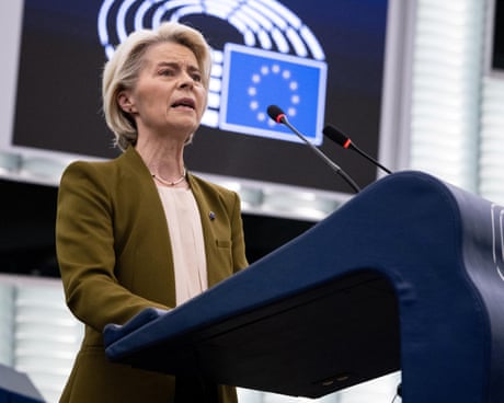 Von der Leyen standing behind a lectern and speaks into a microphone