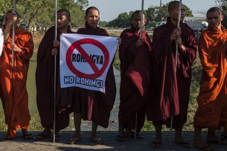 Buddhist monks and other anti-Rohingya supporters rally outside Yangon’s Thilawa port